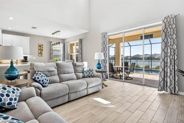 Fit a large sectional + in floor outlets.