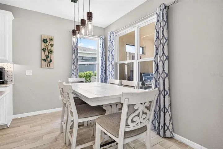 A second dining area just off the kitchen frees up the front room.