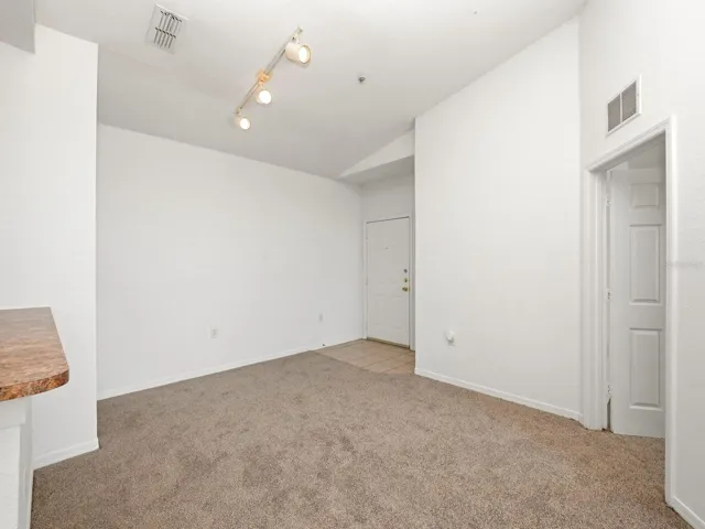 Main door and Primary Bedroom door to the right