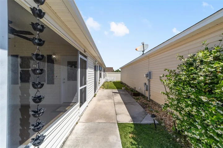 Access to side yard from lanai and sliders from Living/Dining Areas.