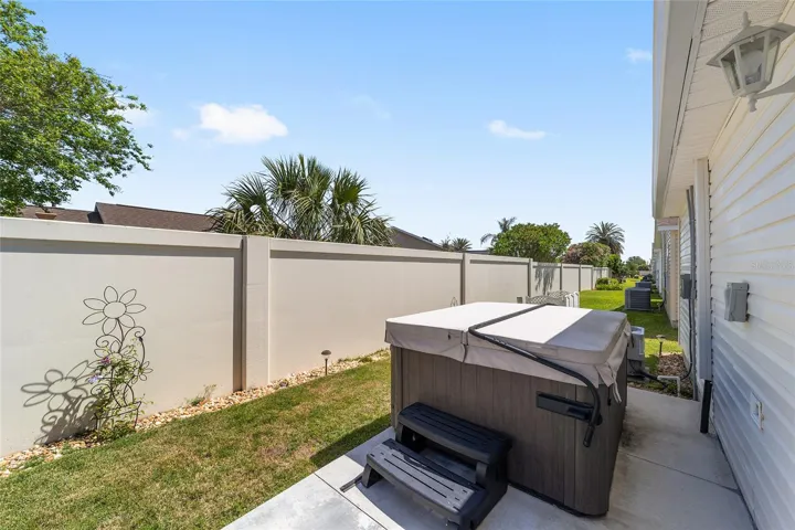 Privacy wall beyond Hot Tub.