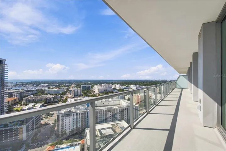 Due to angle of the building there are views to both the bay and the gulf form the 60 ft balcony