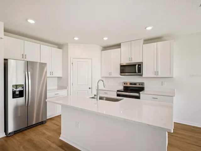 Interior photos are not of the actual home but are photos of the builder home with the same floorplan with similar interior finishes and features.