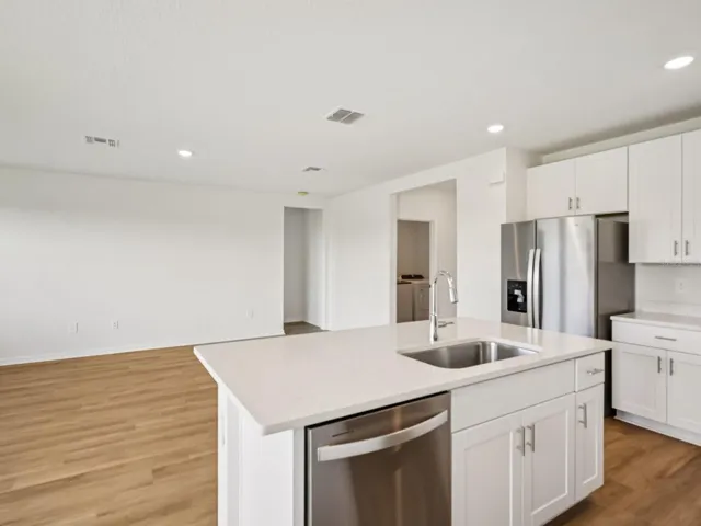 Interior photos are not of the actual home but are photos of the builder home with the same floorplan with similar interior finishes and features.