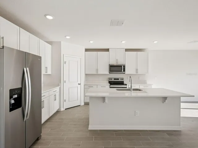 Interior photos are not of the actual home but are photos of the builder home with the same floorplan with similar interior finishes and features.