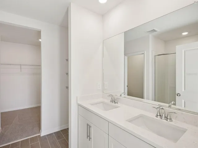 Interior photos are not of the actual home but are photos of the builder home with the same floorplan with similar interior finishes and features.