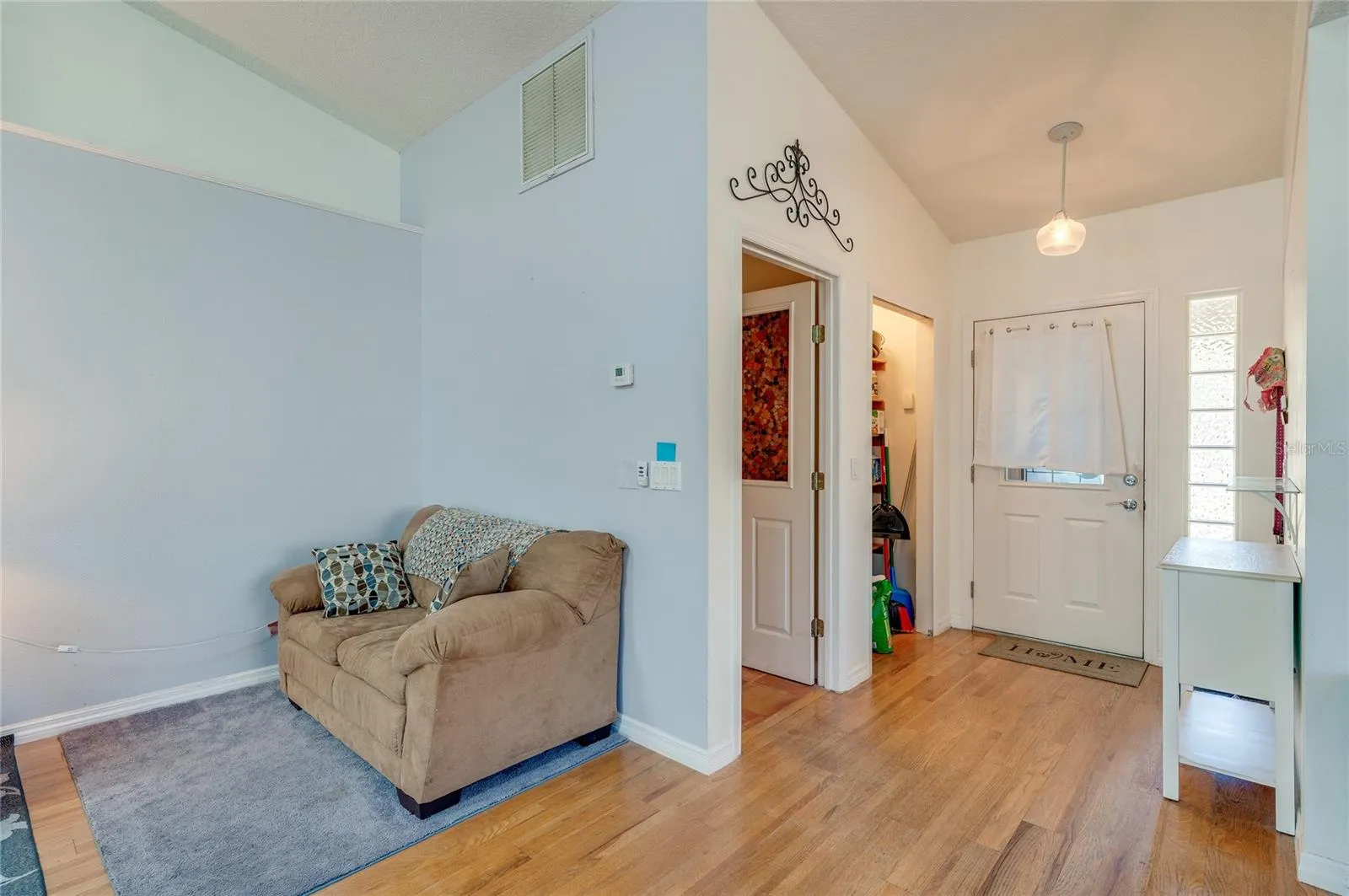 Living room on the left, entry on the right