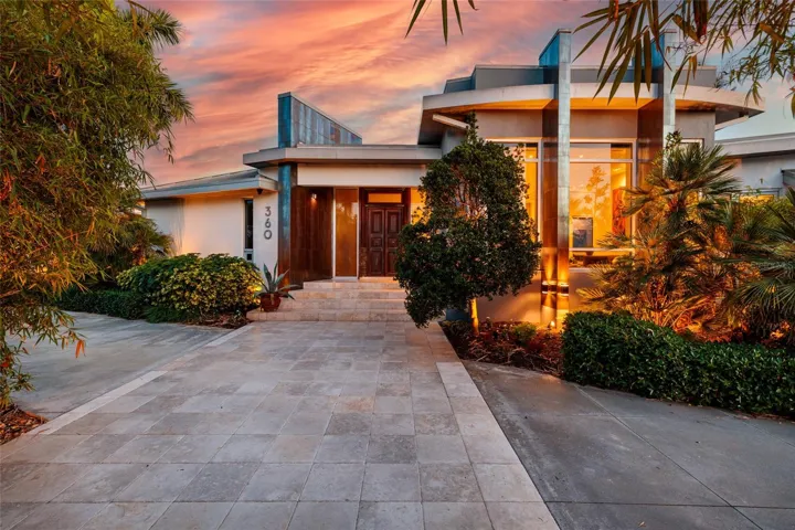 Sunset glow surrounds your luxury waterfront home