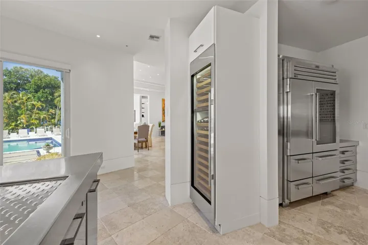 Great flow from Kitchen to Formal Living areas for entertaining (Wine anyone?)