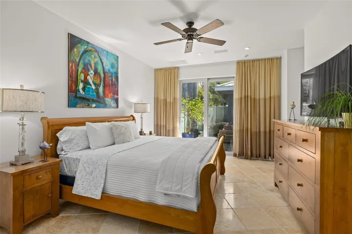 Private guest suite with serene courtyard access and designer accent wall