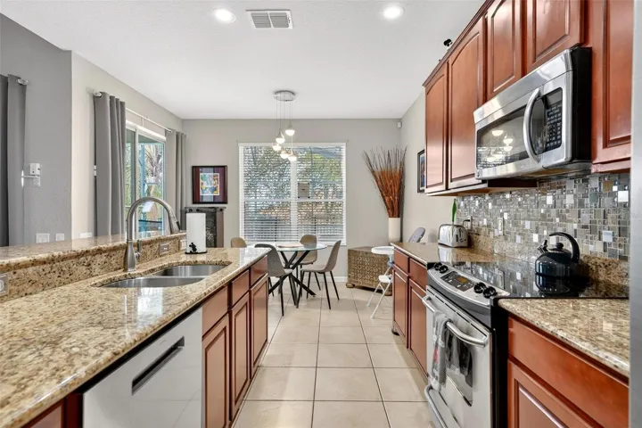 Kitchen_and_breakfast_nook_by_double_window