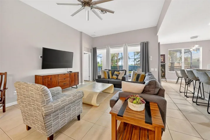 Slider_to_pool_from_family_room_kitchen_to_right_and_primary_bedroom_to_left