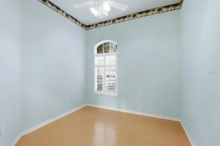 Den in front with plantation  shutters