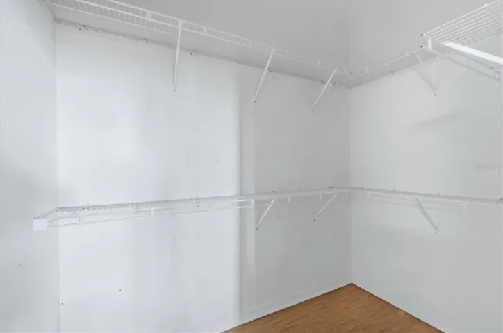 Spacious main Bedroom Closet with tall ceilings