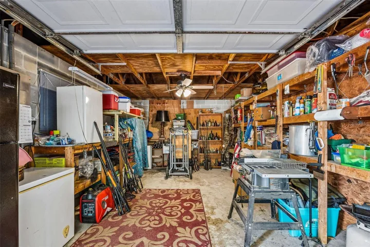 Or inside the garage which you might prefer to use as a workshop