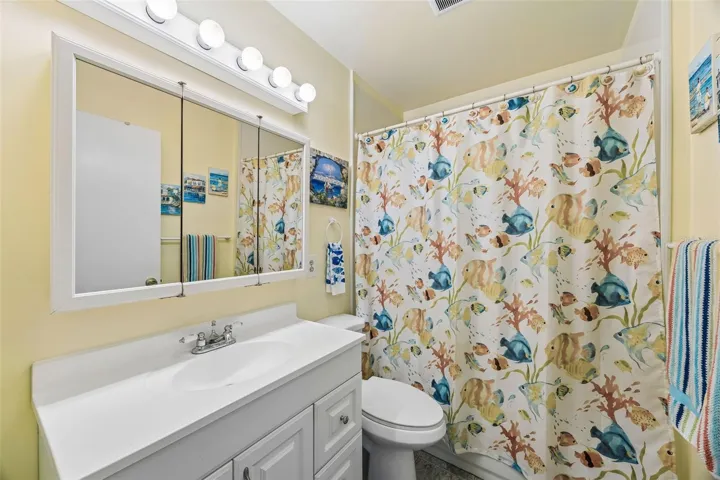 And bathroom with tub and shower