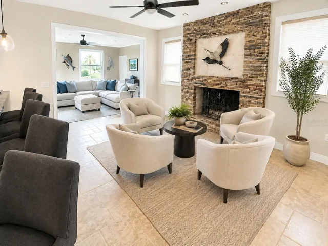 Relax by the wood-burning fireplace. (Virtually staged)
