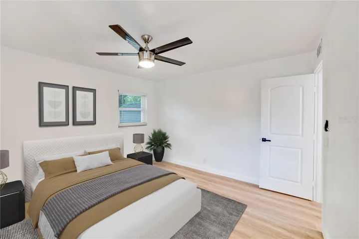 Virtually staged primary bedroom