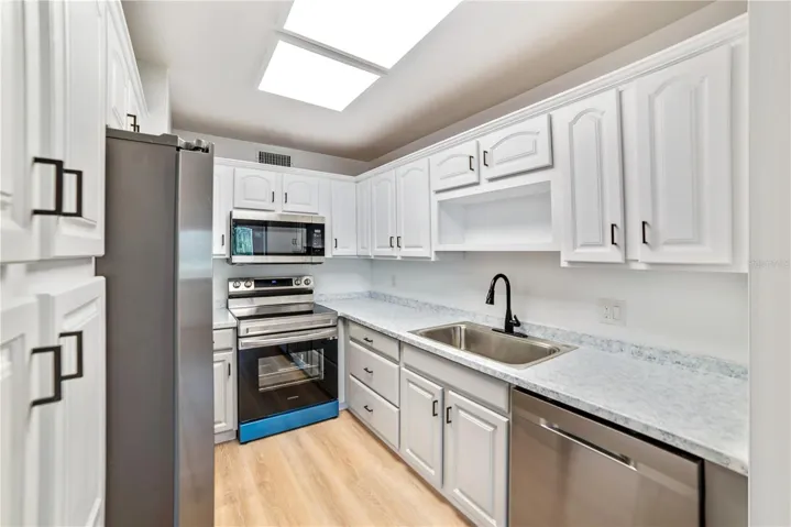 Updated kitchen with stainless appliances