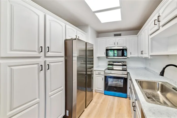 Updated kitchen with stainless appliances