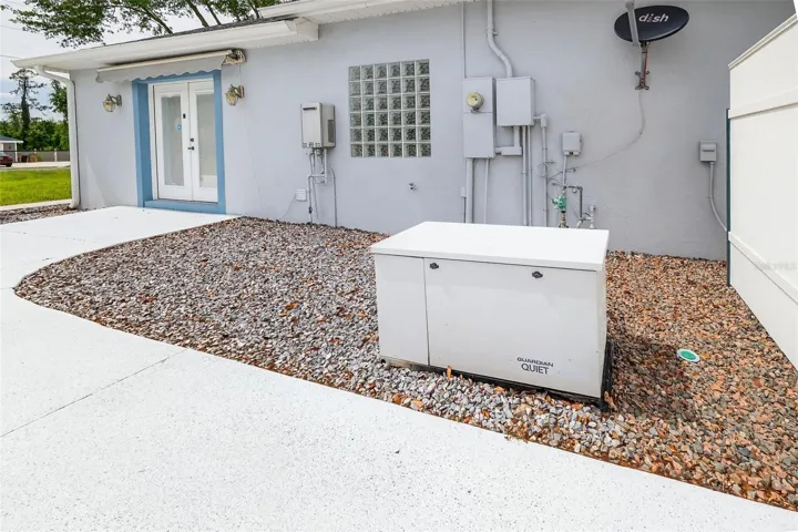 Bonus Room Exterior Doors with Awning and Guardian Generator
