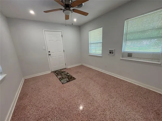 Laundry Room off the kitchen, leads to back door