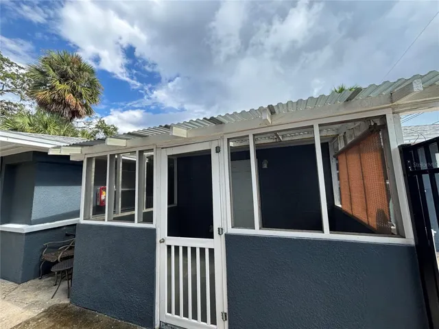 Screened lanai at back of house