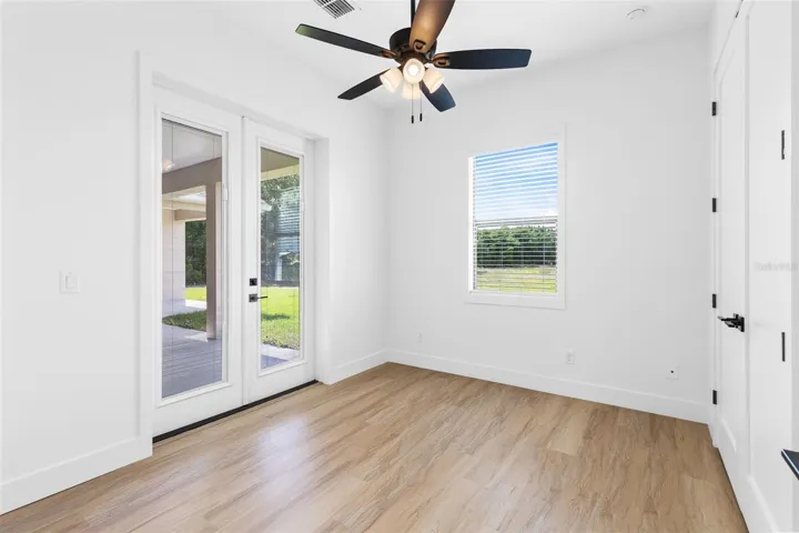 Bedroom 2 with access to back porch