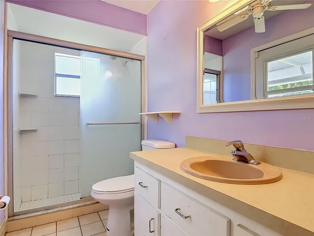 ensuite bathroom with door to pool