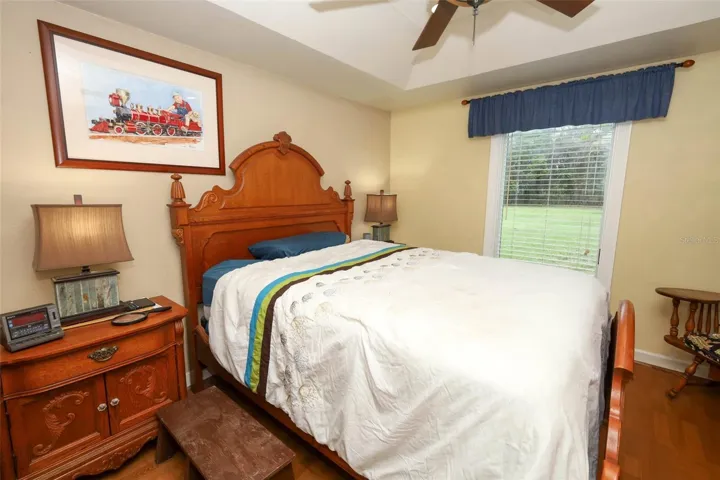 Primary bedroom with backyard view
