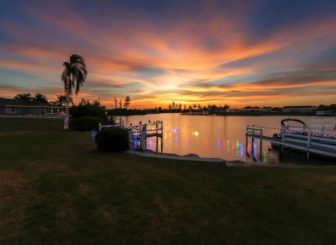 Middle lake's Christmas lights are only part of the decor the association decorates the docks and lake with several times a year. This photo has been virtually enhanced.