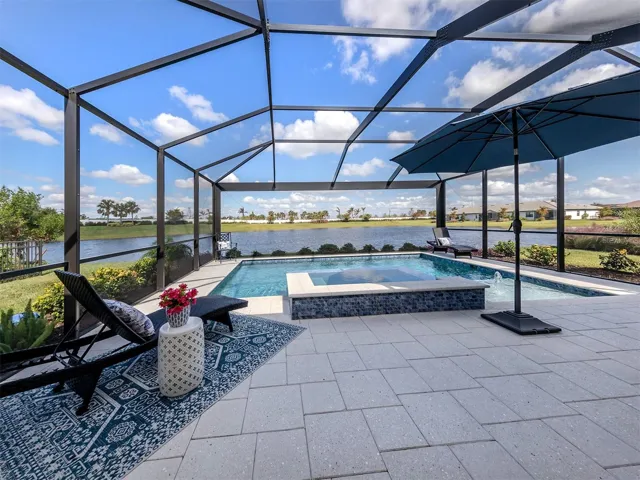 Back lanai, pool, spa and lake view!