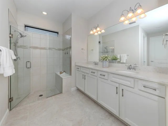 Primary Bath Suite with rimless glass, shower bench and walkin shower
