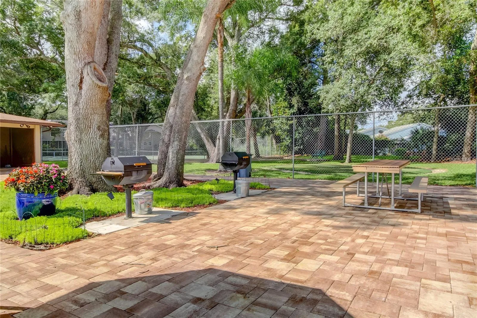 Grill area next to HUGE pool