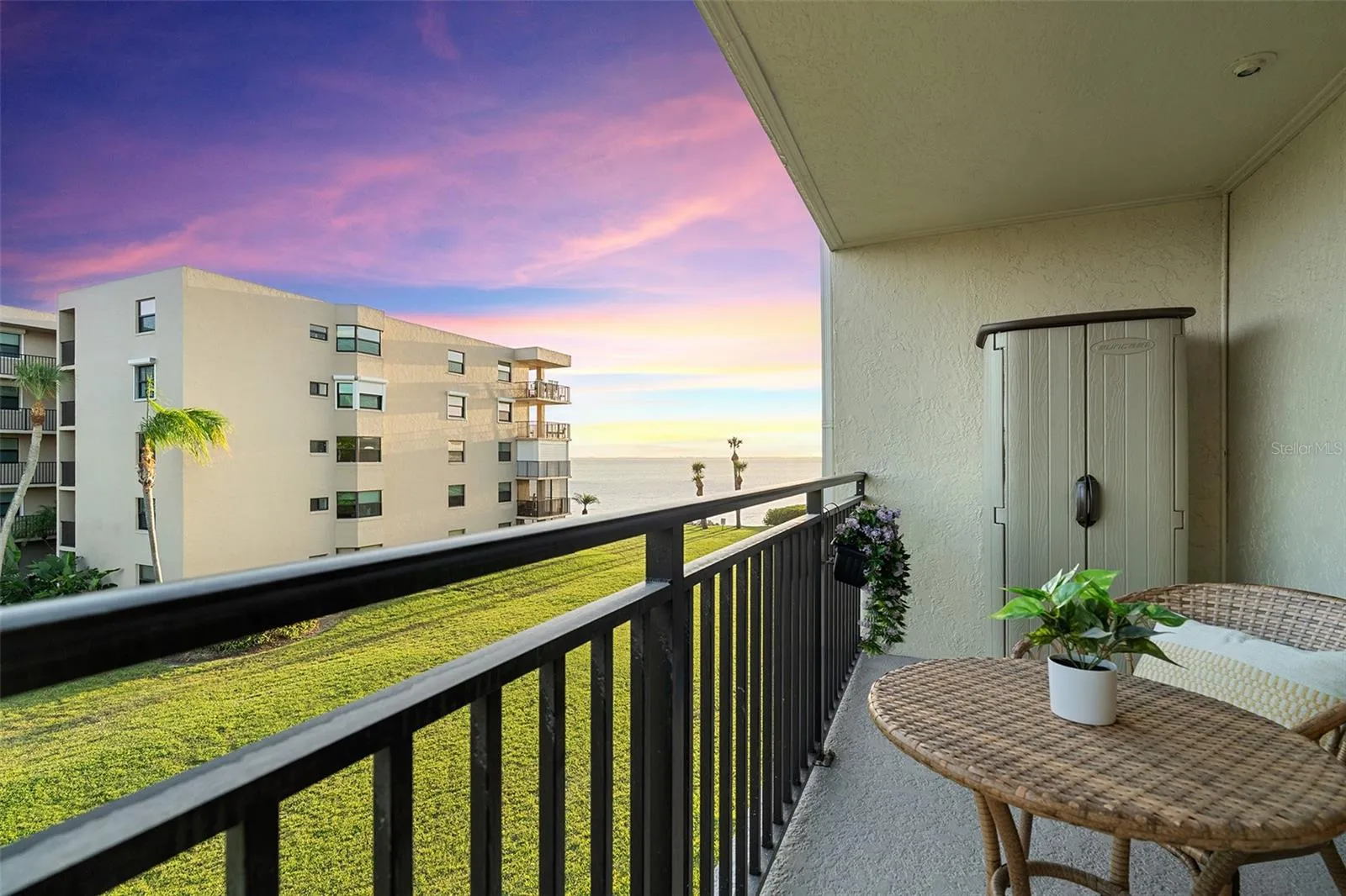 Sunset water views from unit's private balcony!