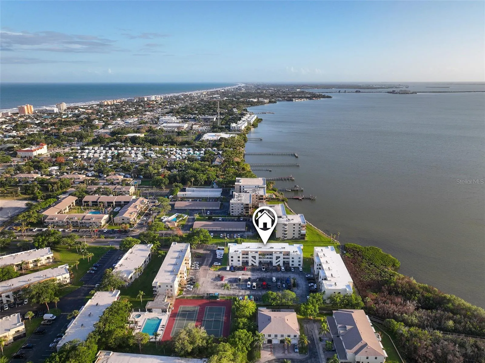 Building next to the intracoastal Banana river. Other side of pensinsula is the Atlantic ocean