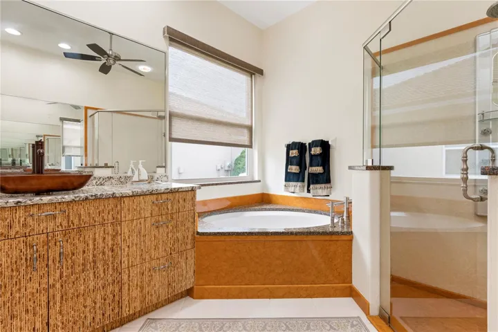 Master Bath with tub and second counter and updated sink.