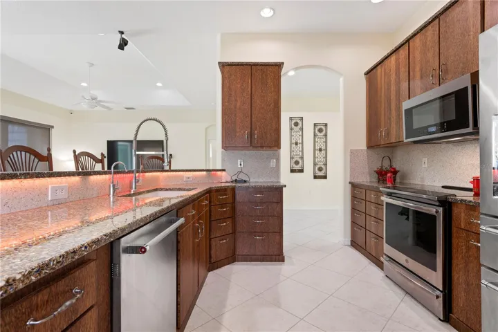 Kitchen with lighted countertops.