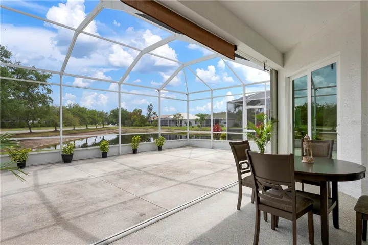 Covered lanai with huge, screened-in play area