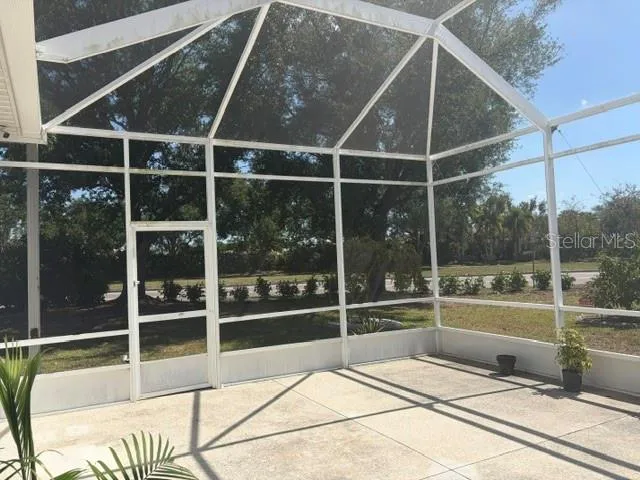 Left side of lanai showing brand new irrigation and plants courtesy of Manatee County!