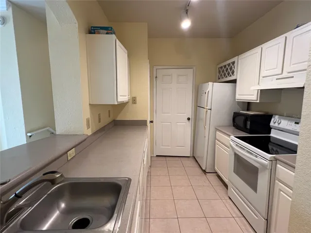 Kitchen with Laundry room at the end