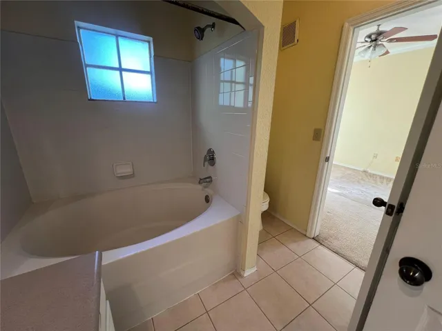 Bathroom:  entry into the primary bedroom, but their is also a door from the hallway for guests
