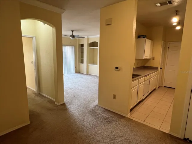 Layout:  standing in dining room.  Bedroom and bath down the hallway to the left