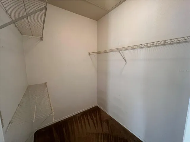 Primary Bedroom walk-in closet