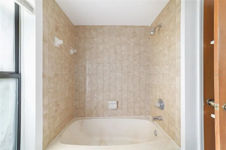 Guest bathroom tub shower combo