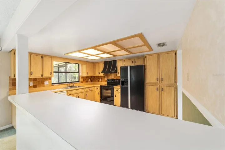 Kitchen with Breakfast Bar or study area