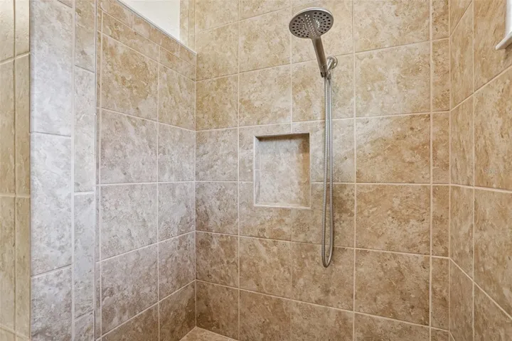 Primary Bathroom- Roman Shower with Built-In Bench