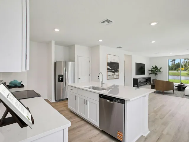 Interior photos are not of the actual home but are photos of the builder home with same floorplan with similar interior finishes and features. Photo uses virtual staging.