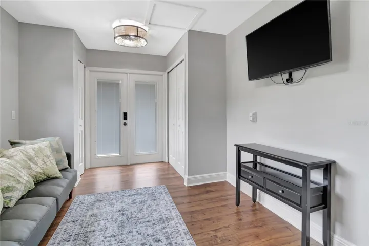 Private guest bedroom with two closets, direct access to the garden and pool, and its own private entrance-ideal for guests or multi-generational living.