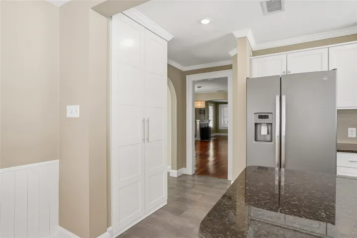 Large pantry closet to tuck away all of your cooking gadgets.